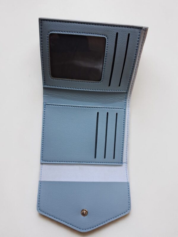 Compact light blue clutch purse for women with flap closure