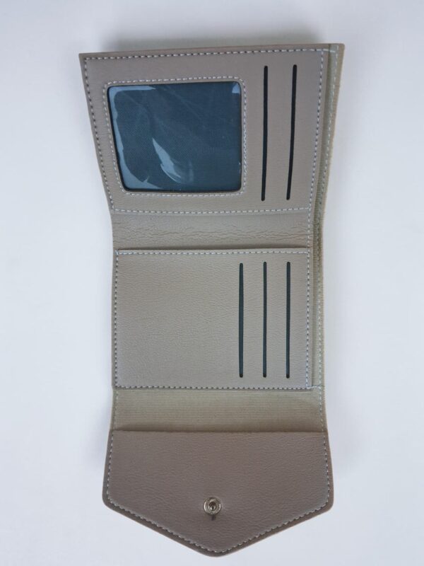 Elegant beige women’s clutch wallet with envelope flap design and textured leather finish