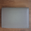 Back view of Elion beige vegan leather envelope wallet for women showing clean reverse side