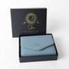 Minimalist light blue clutch wallet for everyday use